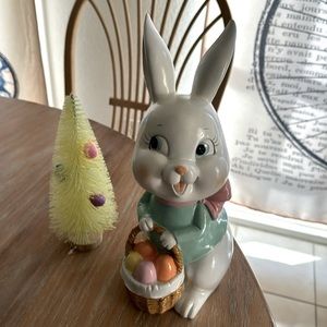 Rabbit w egg basket statue kitschy
